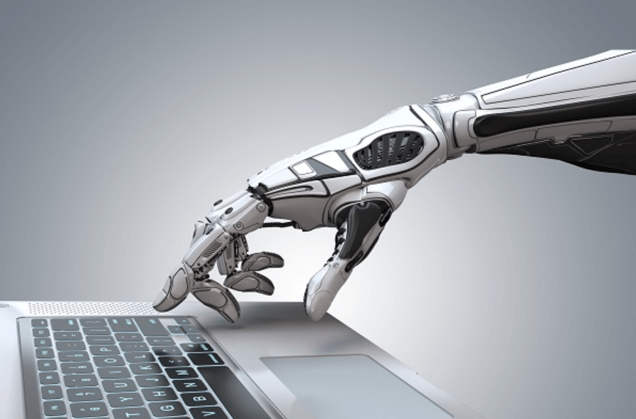 Robotic hand reaching toward laptop keyboard symbolizing automation and artificial intelligence in workflow management