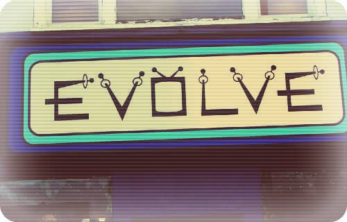 Retro-styled EVOLVE text logo with connected nodes and circuit-like design elements